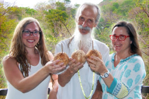 mehtab, laura, and tej with coconuts at blue spirit costa rica